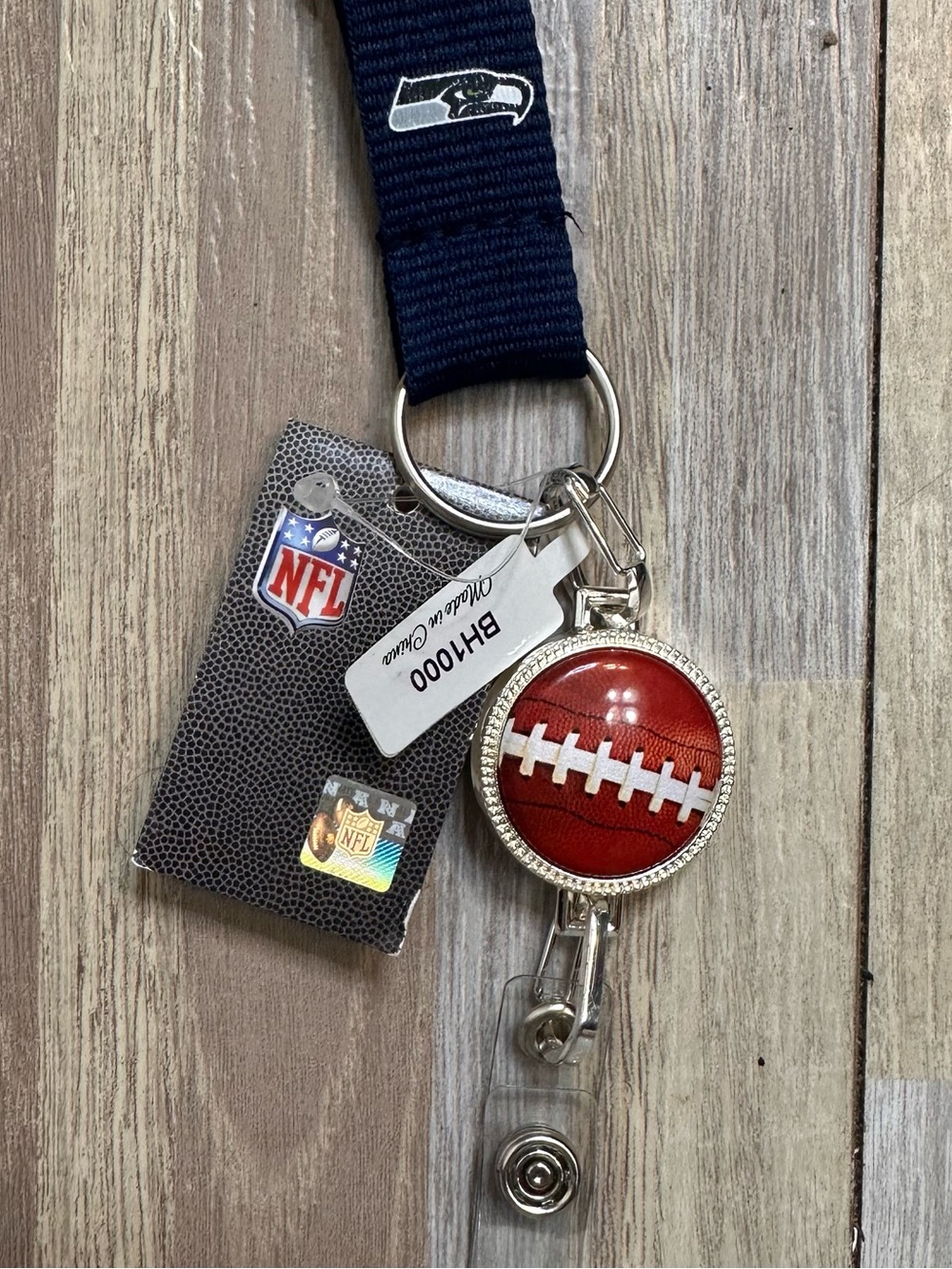 NFL Seattle Seahawks Navy Lanyard with Red Football Badge Reel NWT